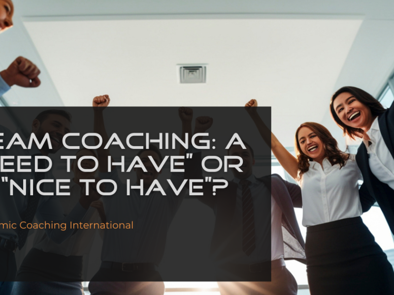 Business team celebrating success together representing team coaching, collaboration, and high-performing teams